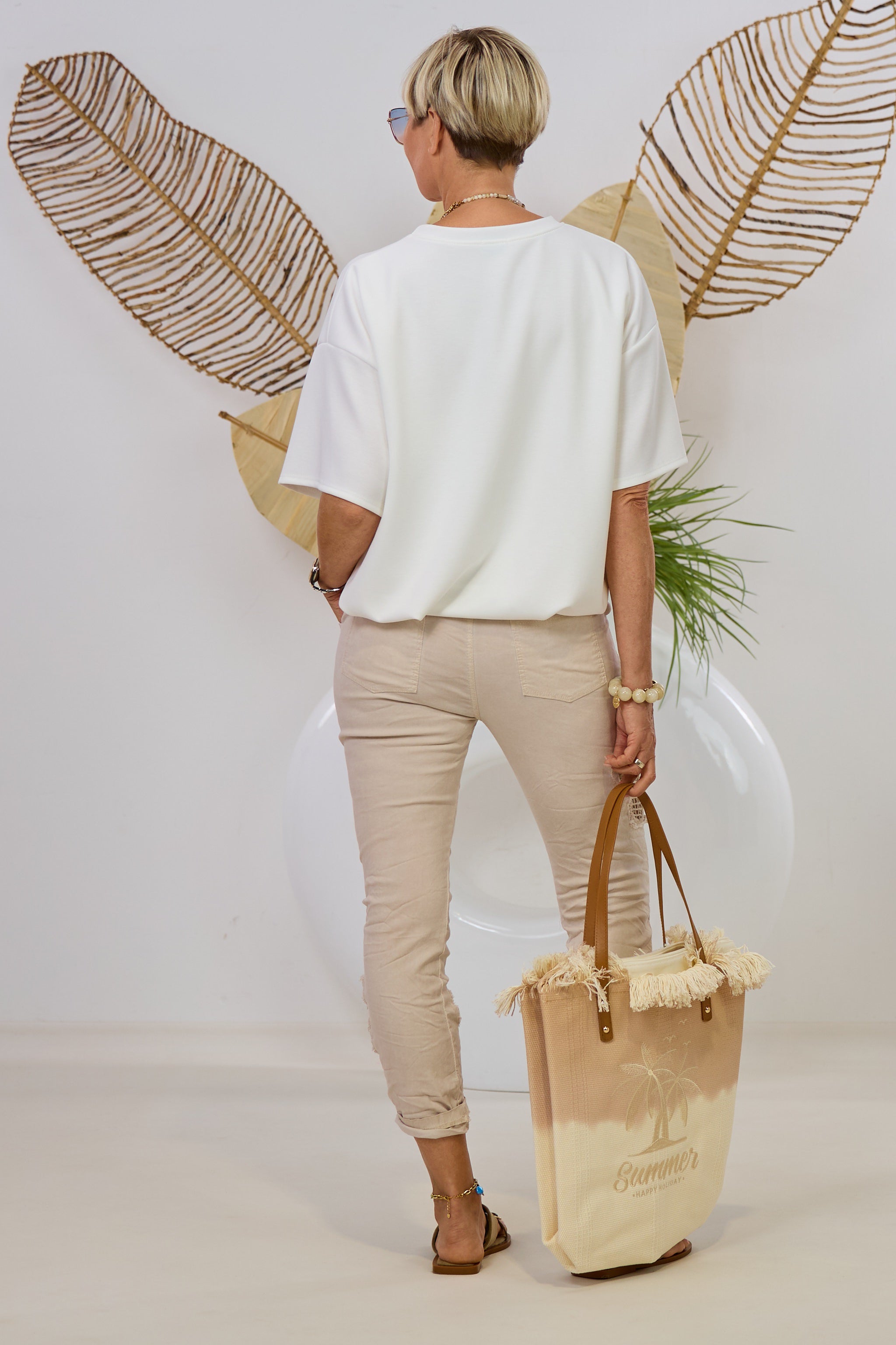 Hose im Knitterlook mit Blumen, beige