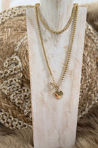 lange Kette aus Perlen mit Herz, gold