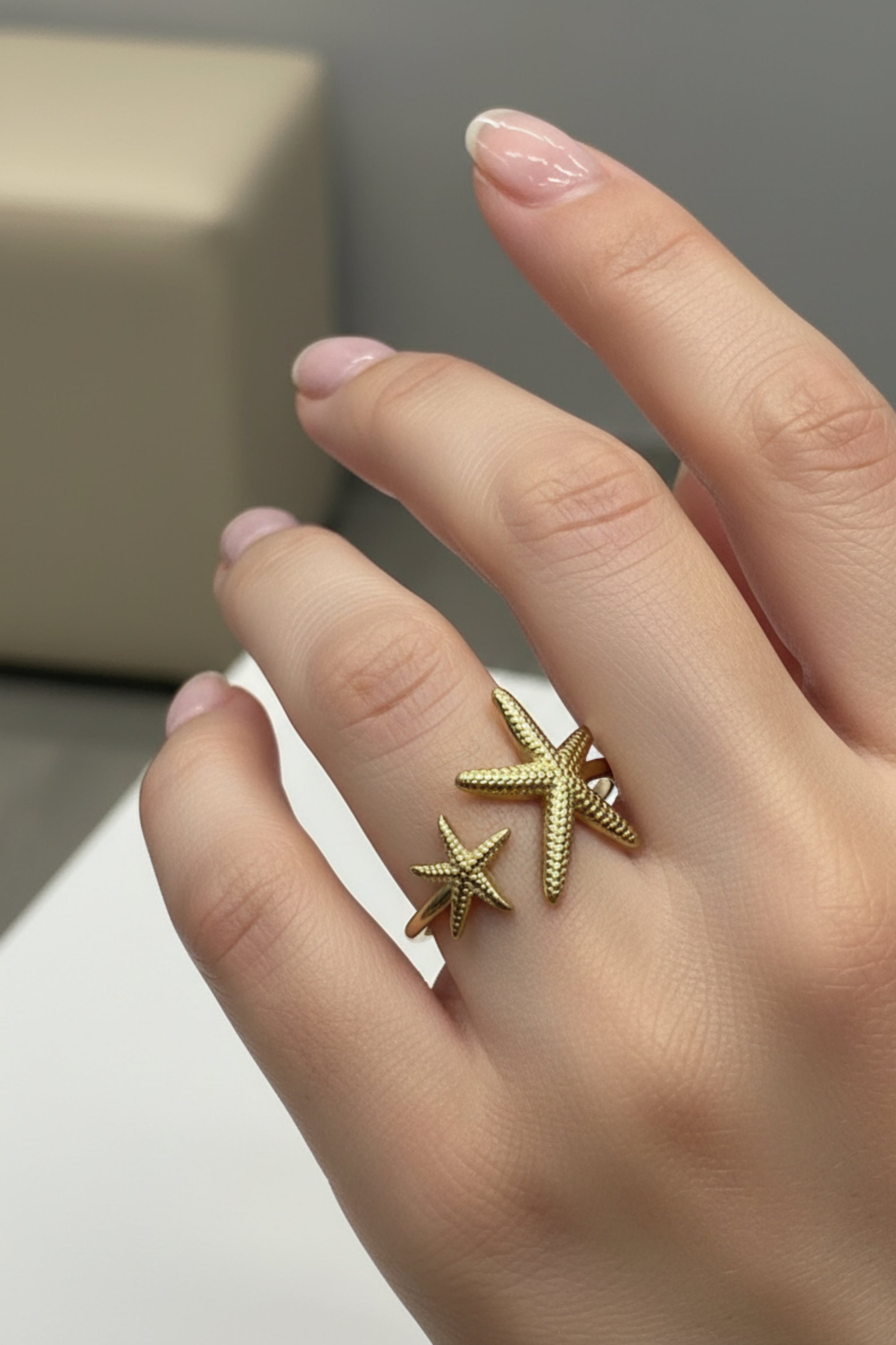 Ring mit Seesternen, gold