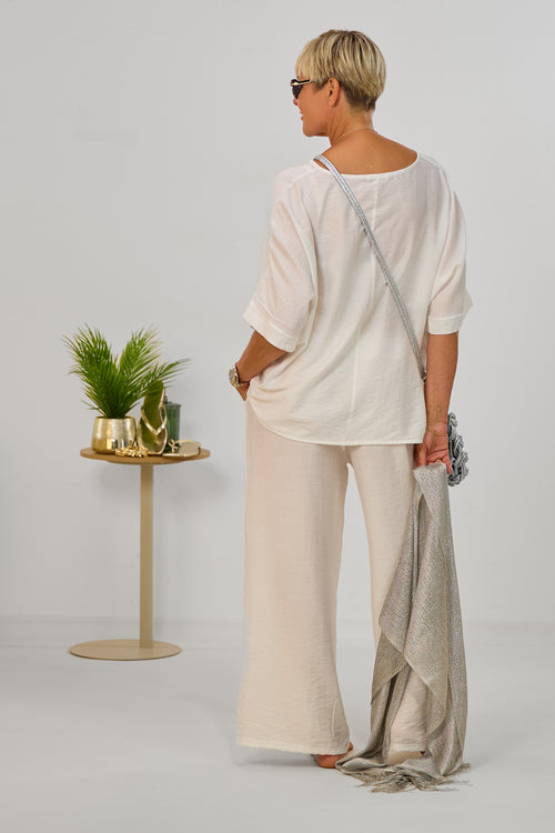 2-tlg. Set aus Blusenshirt und Hose, weiß