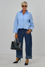 Kurze Bluse mit gewelltem Abschluss, hellblau