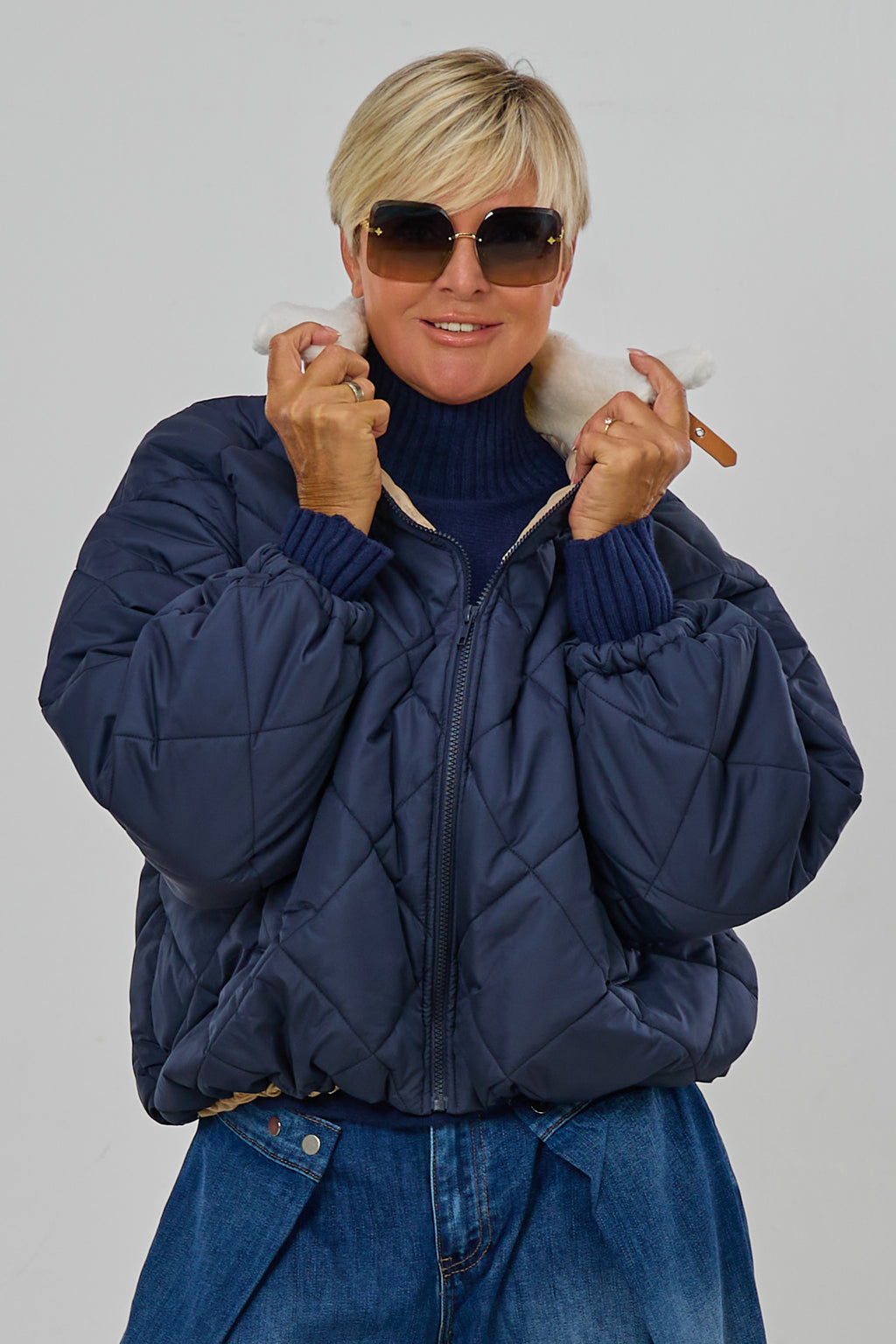 Steppjacke mit Teddyfell-Kragen, marine