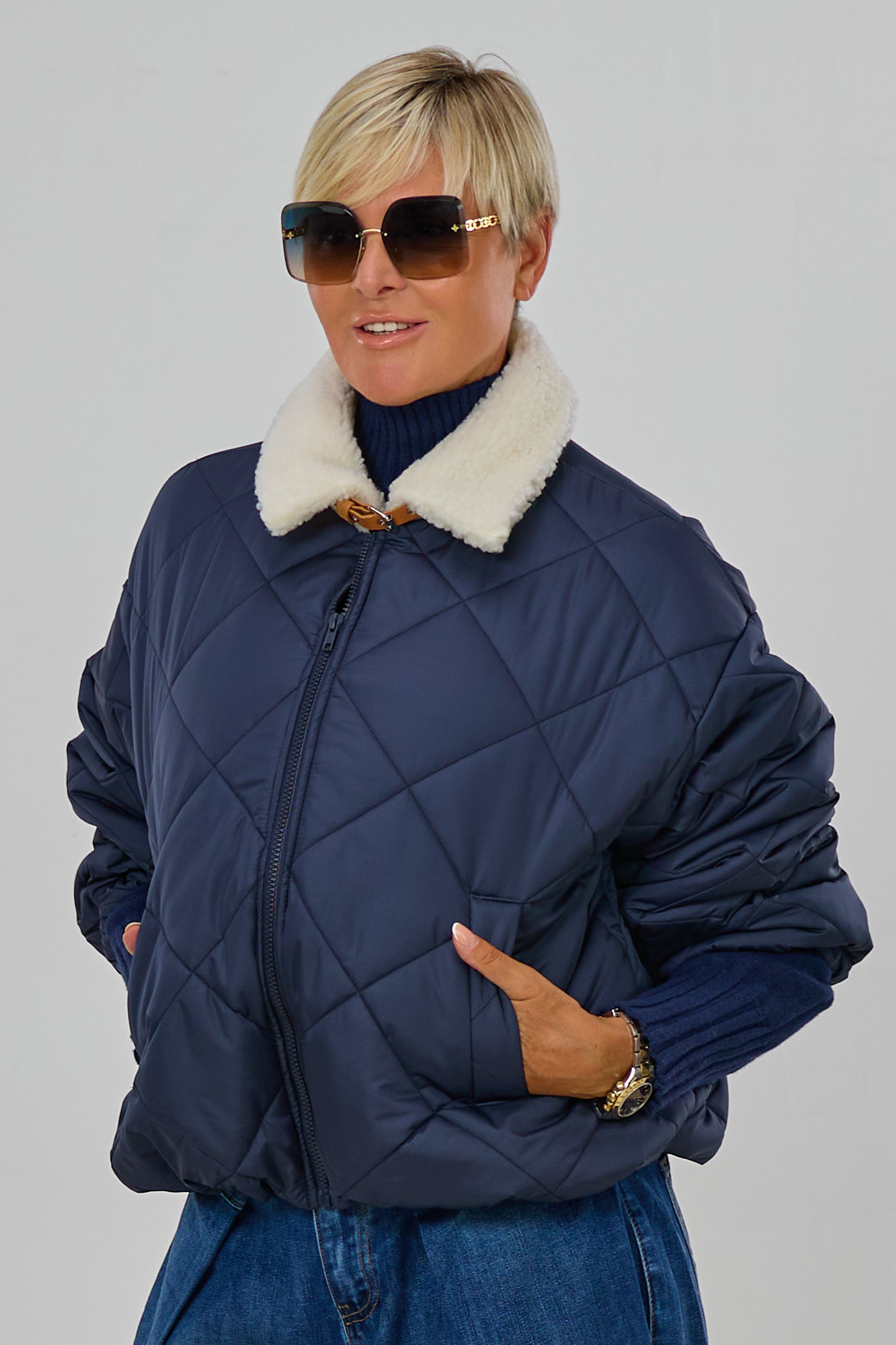Steppjacke mit Teddyfell-Kragen, marine