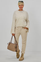 Kuscheliger Strickpulli mit Trompeterärmeln, creme meliert