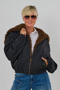 Bomberjacke mit Kapuze und abnehmbarem Teddyfell, schwarz