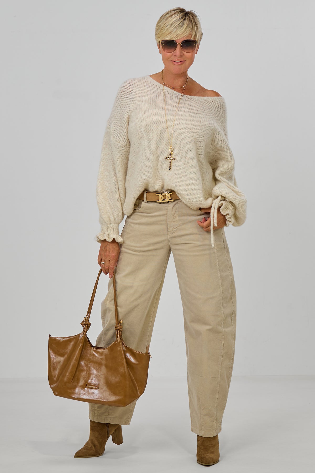 Strickpulli mit gerüschten Bündchen an den Ärmeln, creme meliert