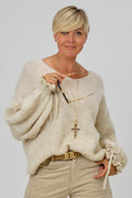 Strickpulli mit gerüschten Bündchen an den Ärmeln, creme meliert