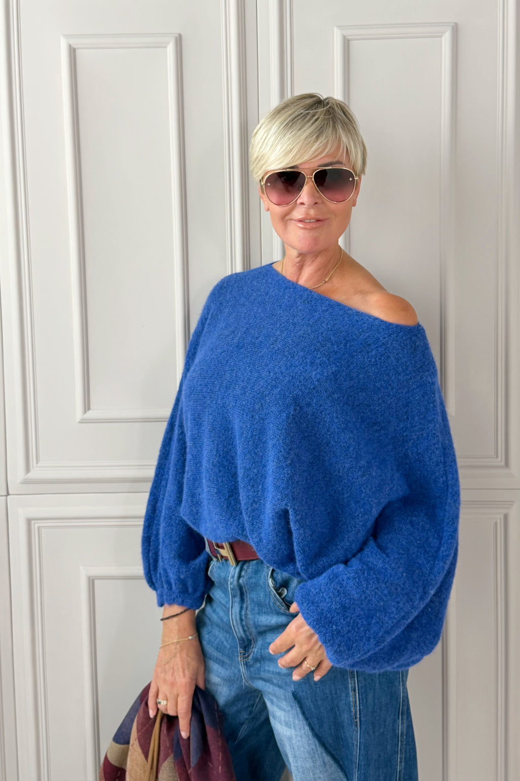 Strickpulli mit Fledermausärmeln, blau-schwarz-meliert