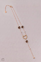 Kette mit unterschiedlichen Herz-Elementen, gold-taupe