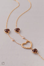 Kette mit unterschiedlichen Herz-Elementen, gold-taupe