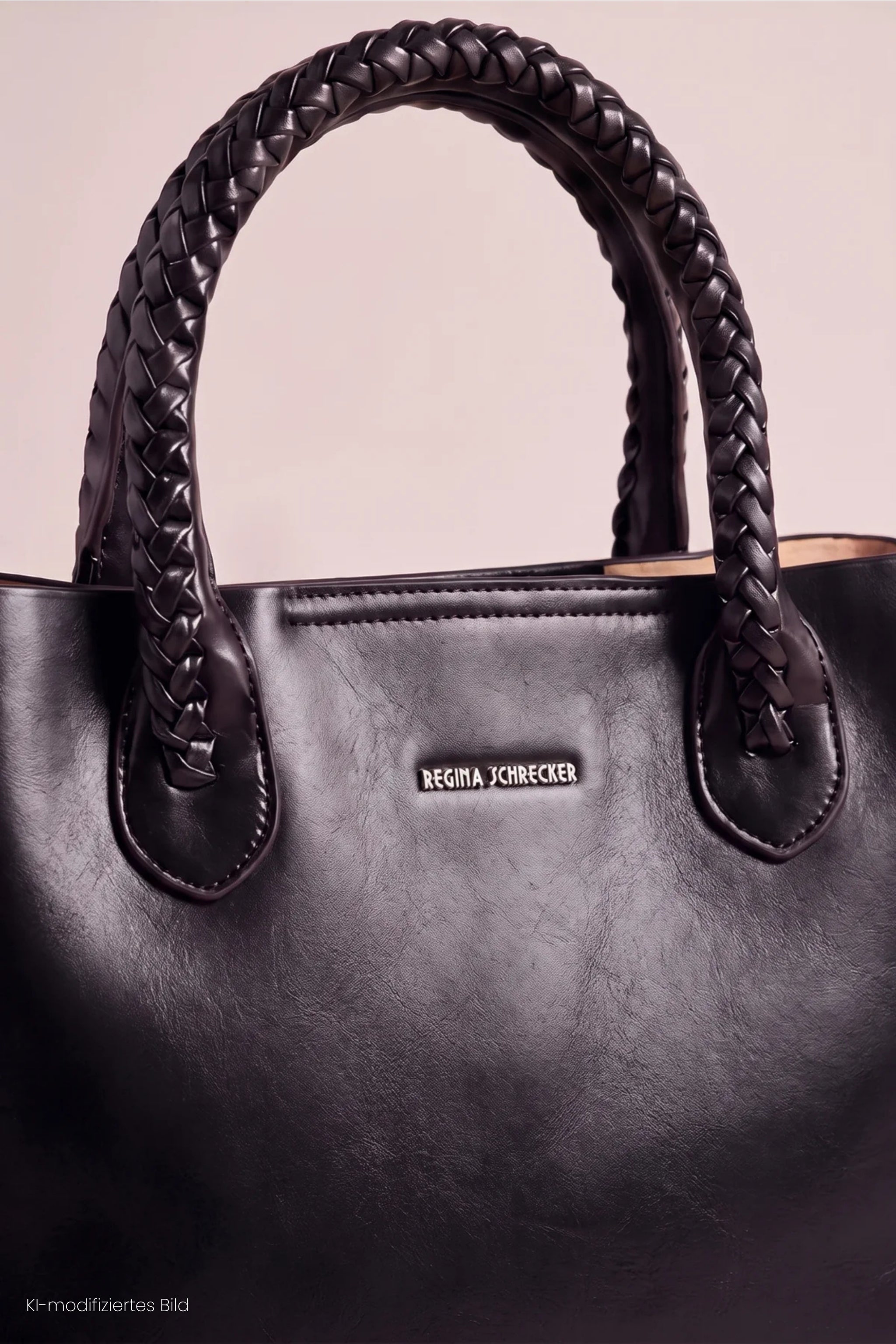 elegante Tasche mit geflochtenem Henkel, schwarz