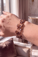 Armband mit Perlchen, mokka-gold