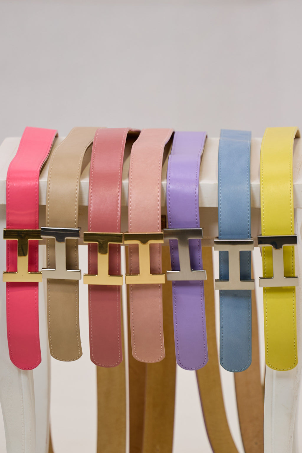 Leather belt with silver buckle, yellow