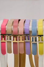 Leather belt with silver buckle, yellow