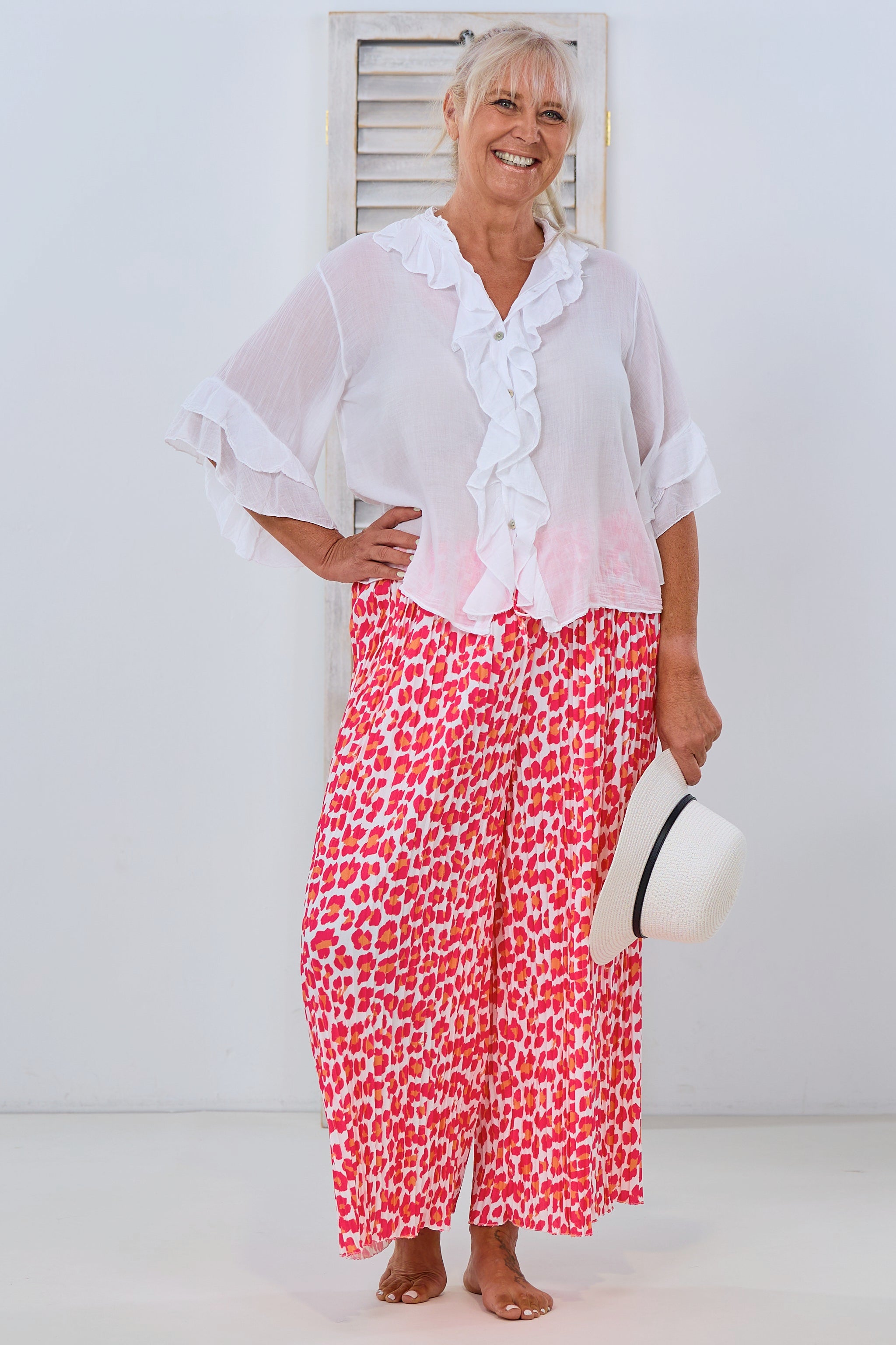 Plissée Hose mit leo Muster, pink-orange