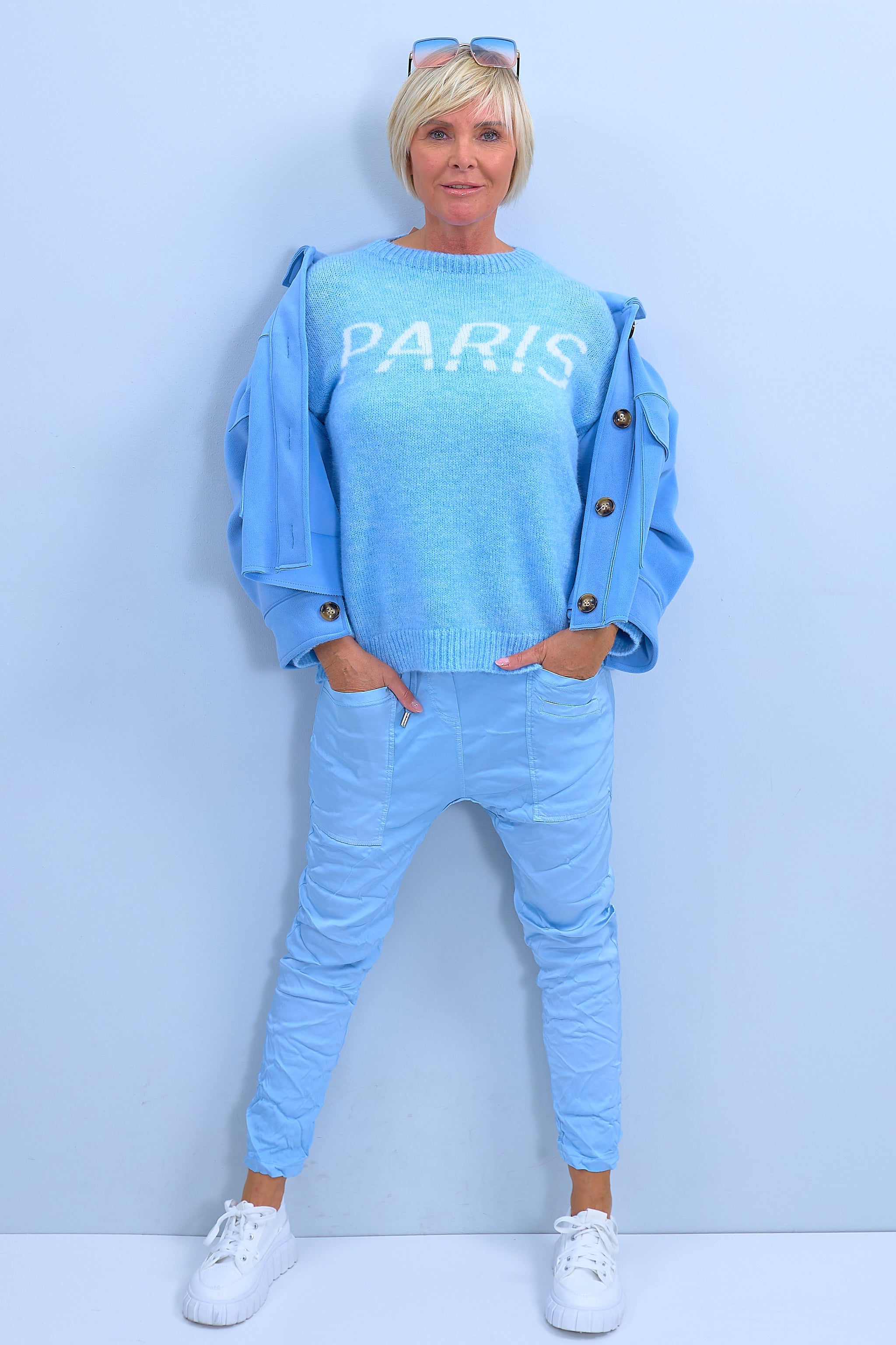 Knitted sweater with knitted lettering, light blue-ecru
