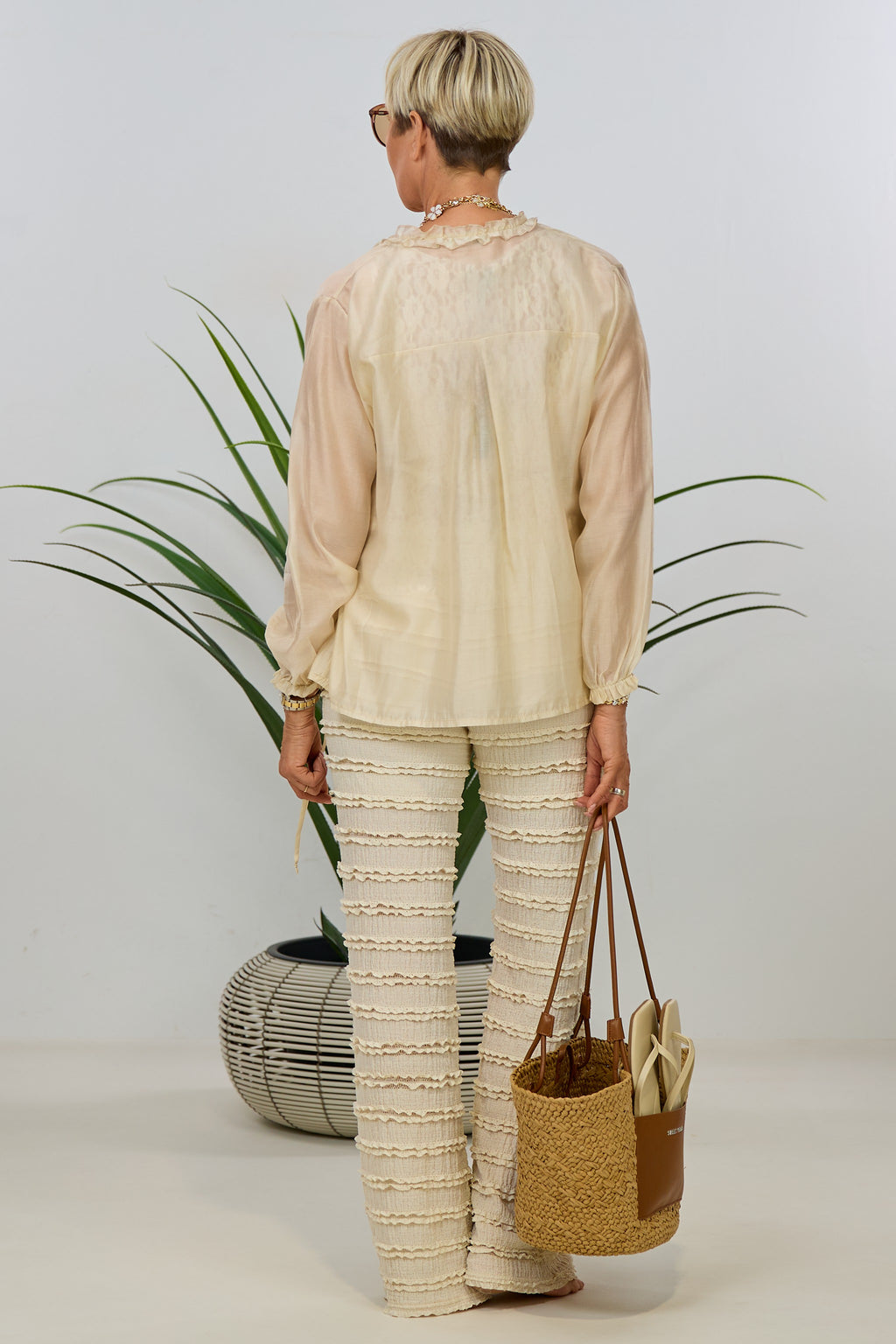 Lightweight blouse with ruffles and ribbons, beige