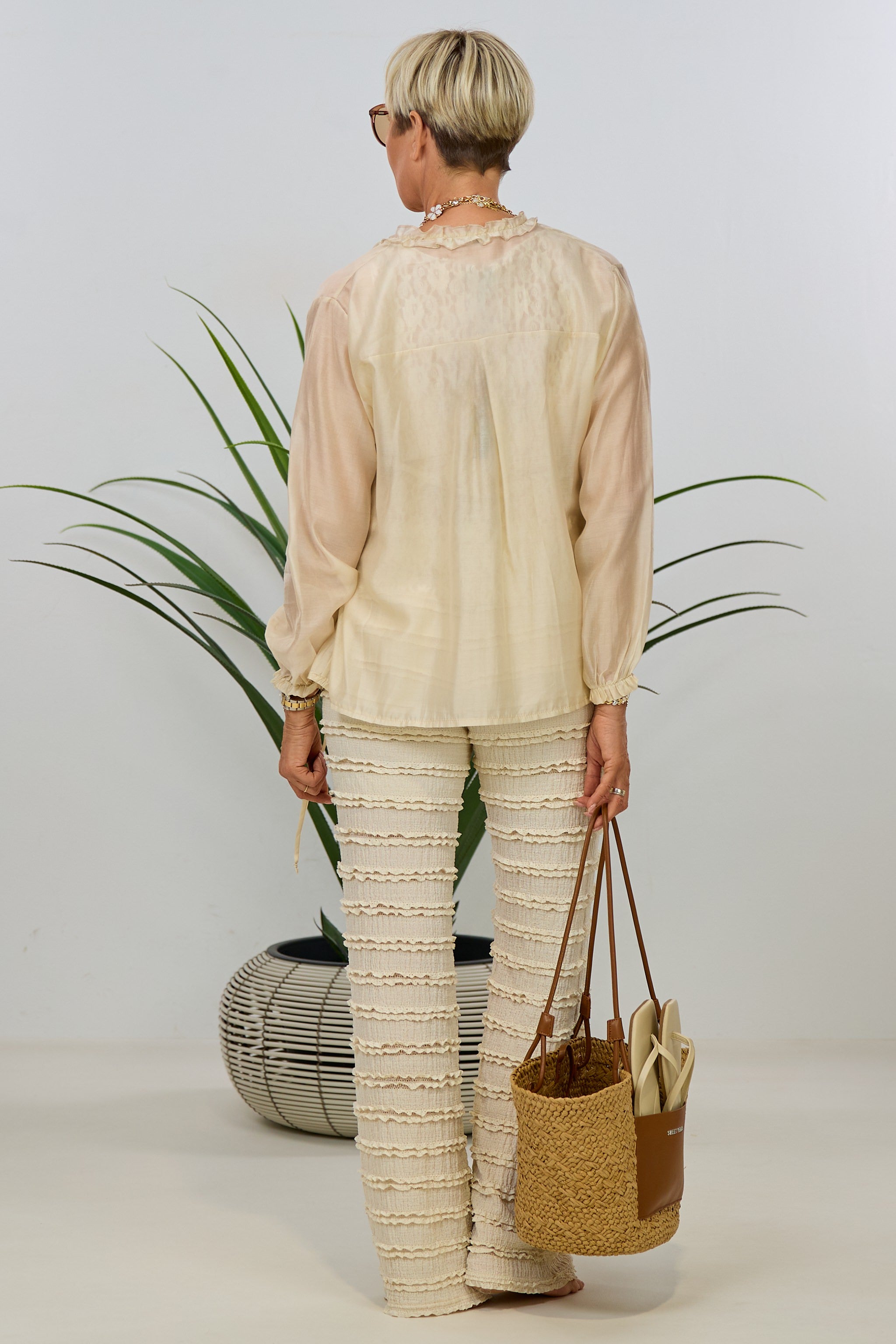 Lightweight blouse with ruffles and ribbons, beige