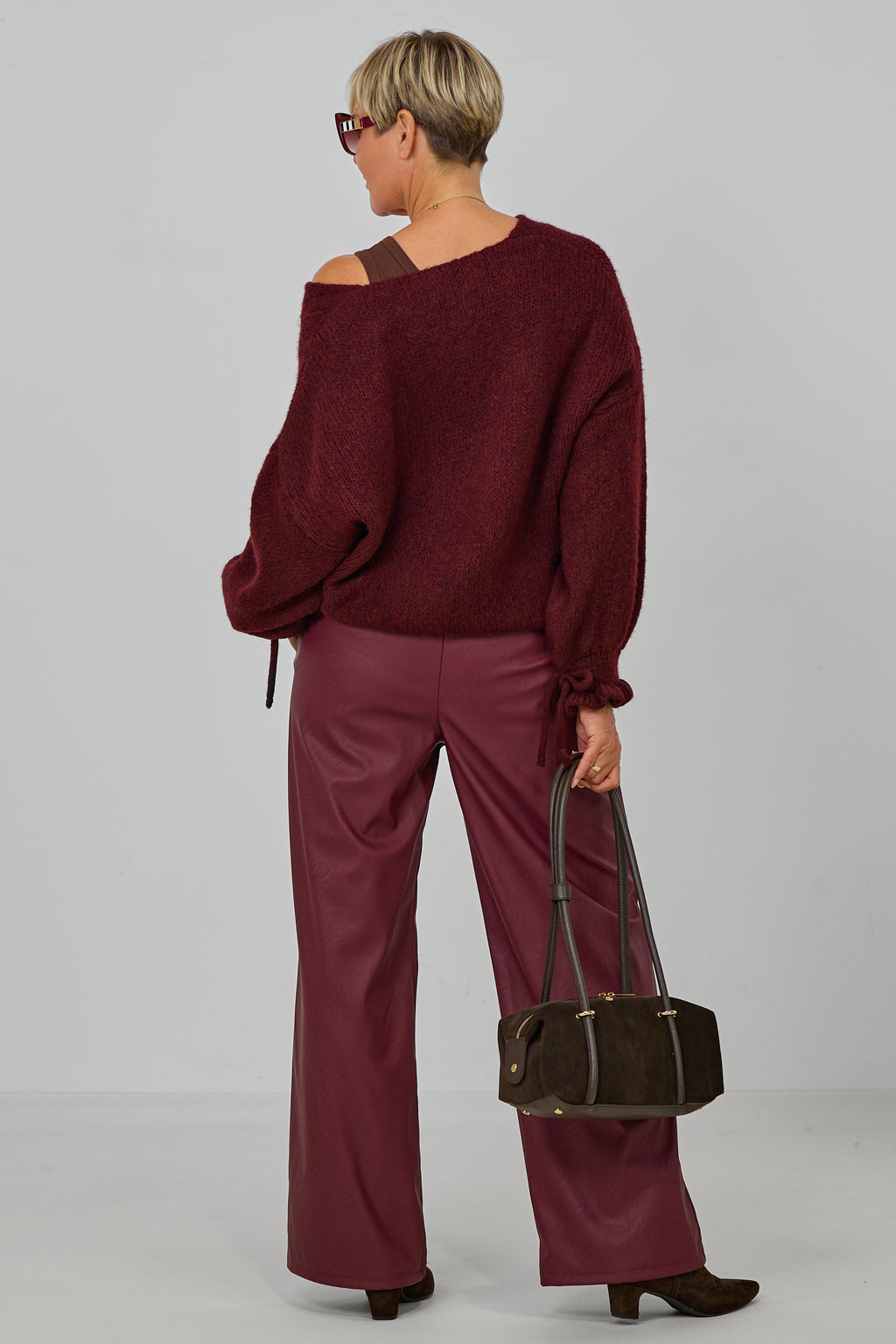 Strickpulli mit gerüschten Bündchen an den Ärmeln, bordeaux meliert