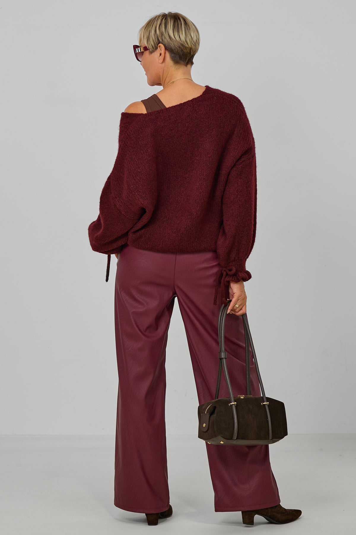 Strickpulli mit gerüschten Bündchen an den Ärmeln, bordeaux meliert