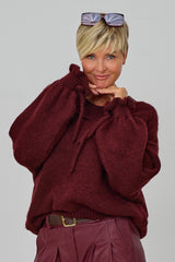 Strickpulli mit gerüschten Bündchen an den Ärmeln, bordeaux meliert